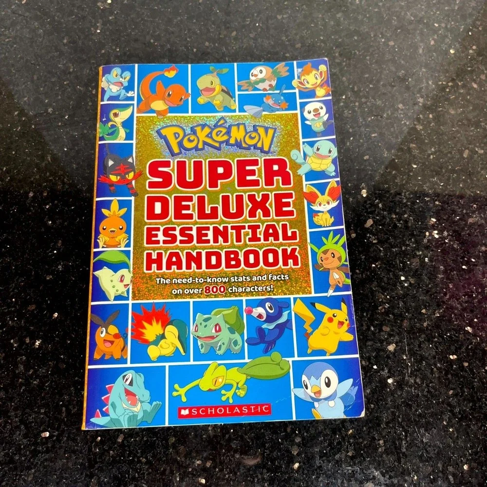 Pokemon Super Deluxe Essential Handbook 2018 Scholastic Characters Stats‎